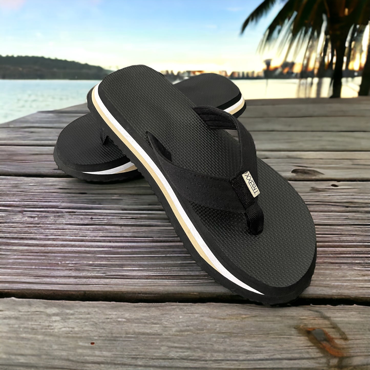 Thongs with an extra wide sole and a lined toe strap for comfort. Modern Black, White and Beige colours